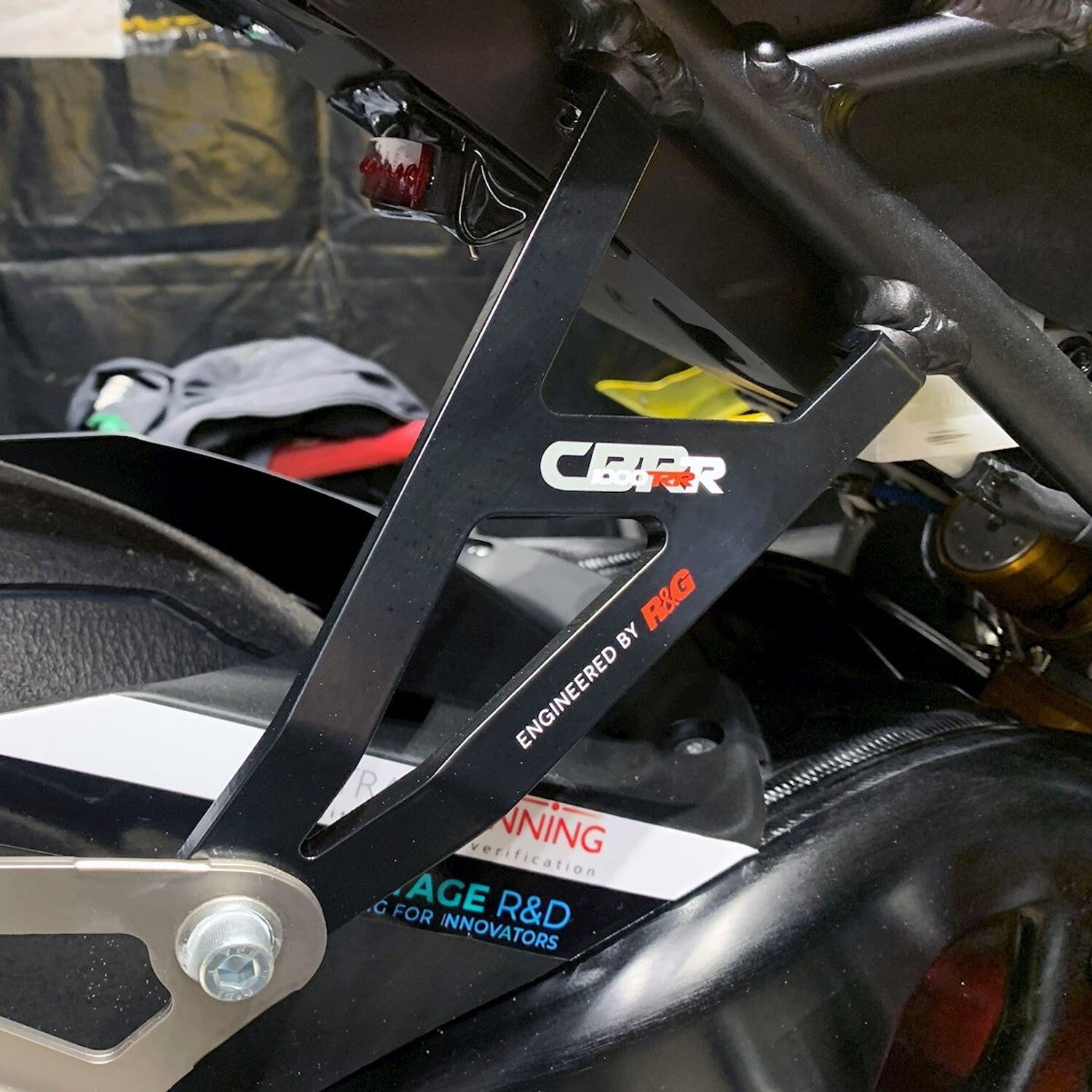 R&G Racing Exhaust Hanger (Single) Black for Honda CBR1000RR-R Fireblade/SP 20-Up