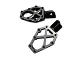 Kodlin KM-K73255 NXL Footpegs Black & Stainless for Softail 18-Up/Pan America 21-Up/Sportster S 21-Up Front Rider