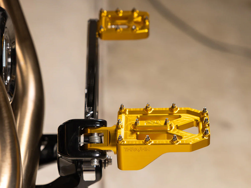 Thrashin Supply TS-TSC-2022-5-SF Aggressor Front Footpegs Gold for Harley-Davidson Softail 18-Up